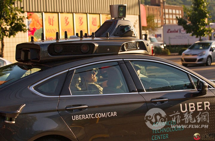 an-uber-driverless-ford-fusion-drives-down-smallman-street-on-2016-picture-id609.jpg