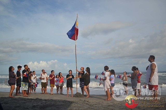 Philippine_Flag_Rises_at_the_West_Philippine_Sea_to_commemorate_Philippine_Indep.jpg
