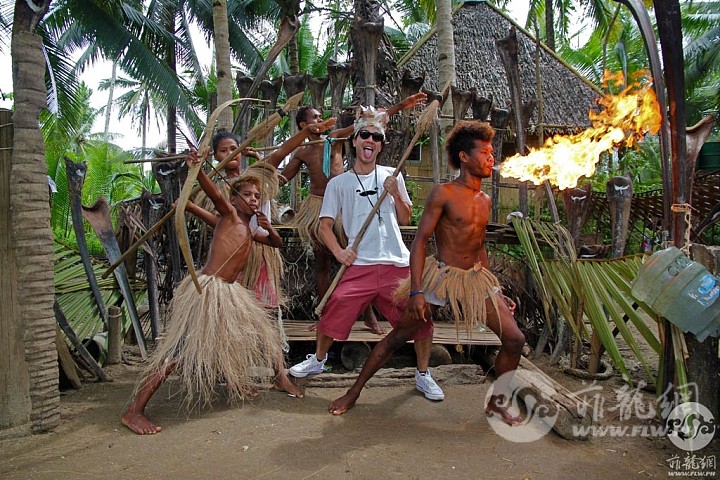 posing-ati-tribe-spitting-fire.jpg
