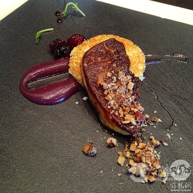 Foie-gras-on-toast-with-ube-reduction-candied-pecans-and-cherry-compote.-traveli.jpg