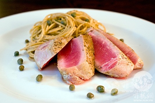 seared-ahi-tuna-with-whole-wheat-pasta-in-a-garlic-lemon-caper-sauce.jpg